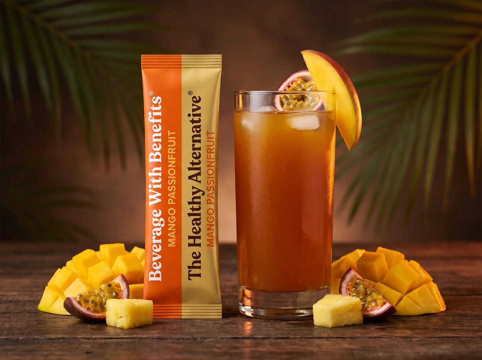 Mango Passionfruit stick pack beside an iced glass